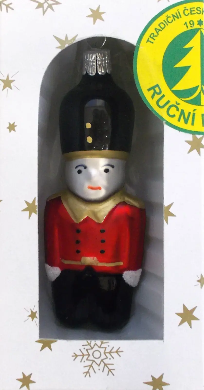 Vánoční ozdoby Britský voják skleněná ozdoba bílá lesklá